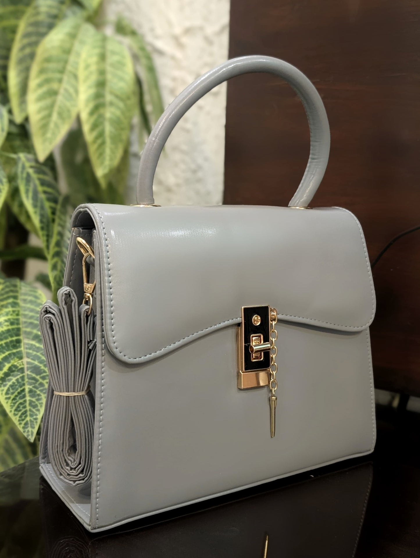 Structured Minimalist Top-Handle Satchel with Gold Pendant Lock