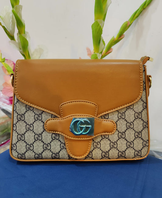 Sophisticated Monogram Canvas Shoulder Bag with Classic Tan Leather Trim