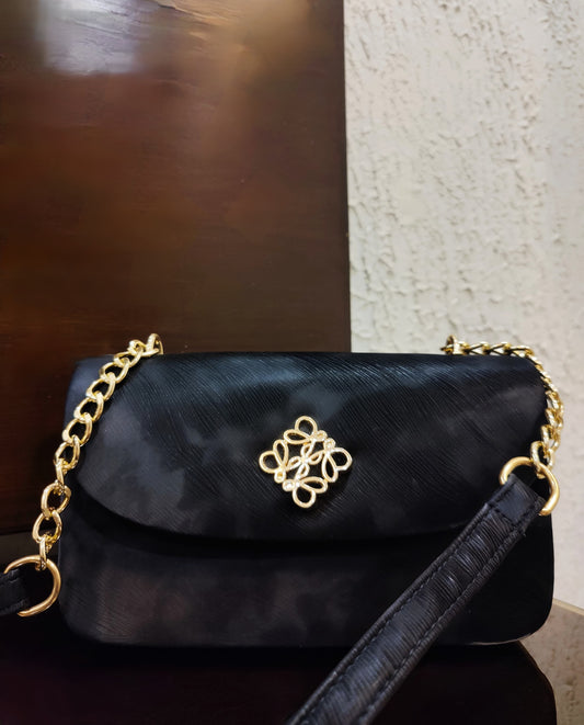 Luxe Quilted Black Evening Bag with Ornate Gold Emblem and Chain Strap