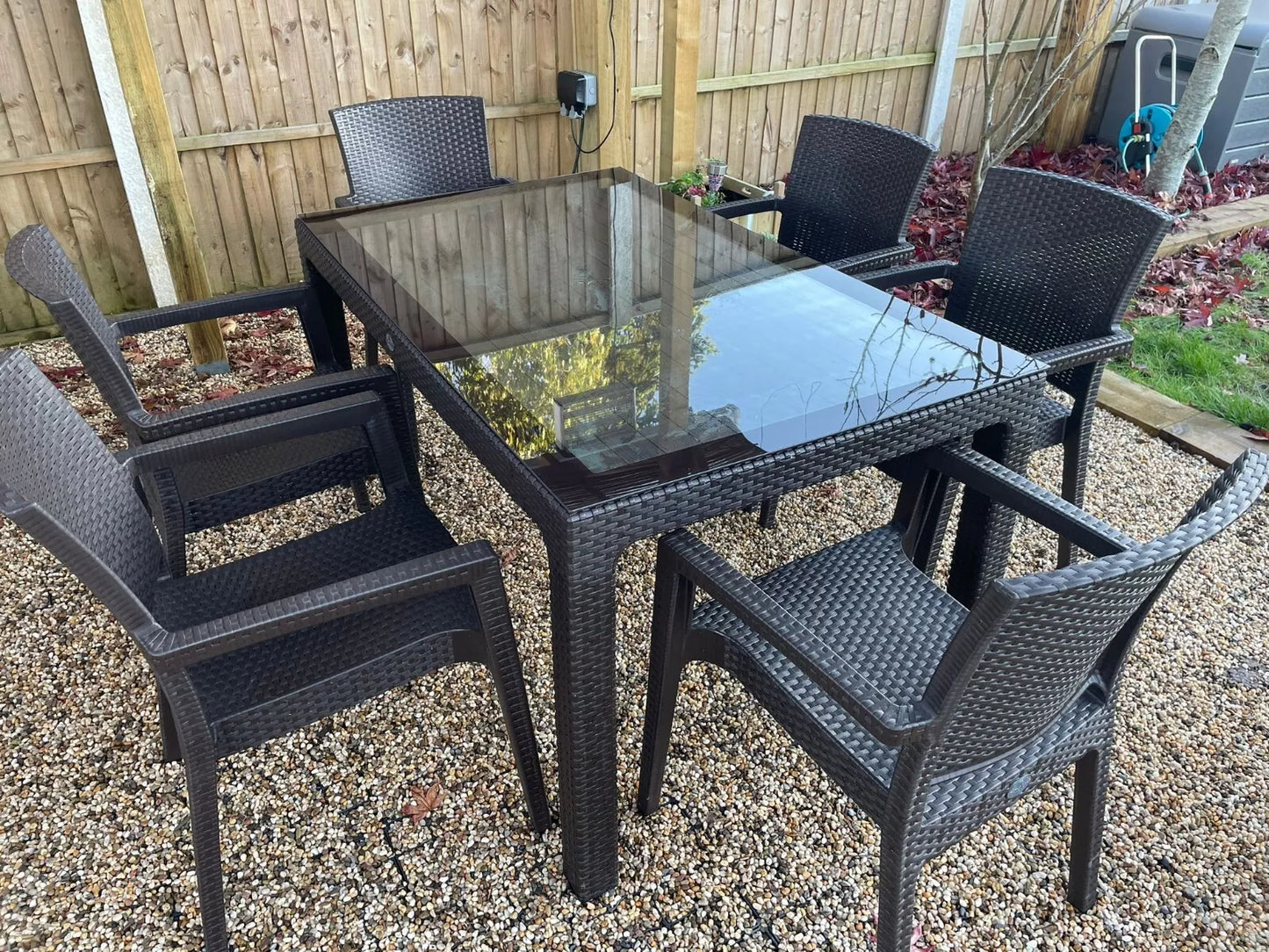 Rattan Effect Garden Furniture Set – Glass Top Dining Table 6 Stackable Chairs